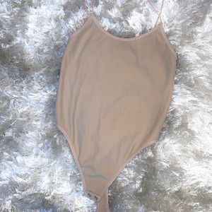 Tan body suit
